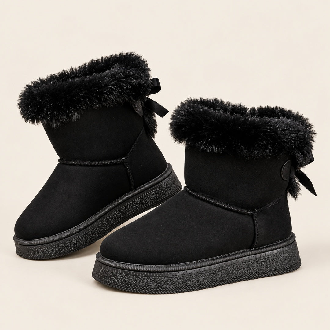 Botas negras con lazo · 1