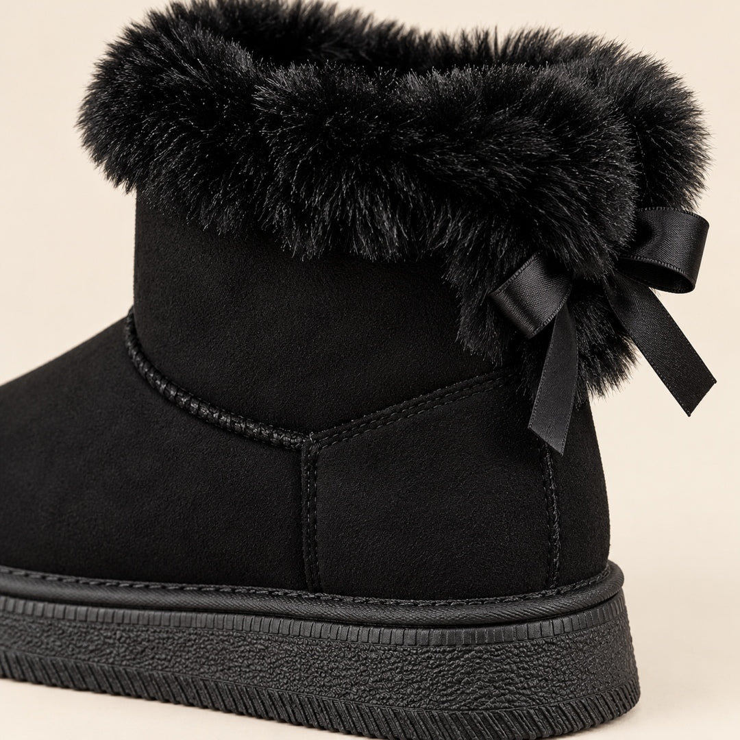 Botas negras con lazo · 3